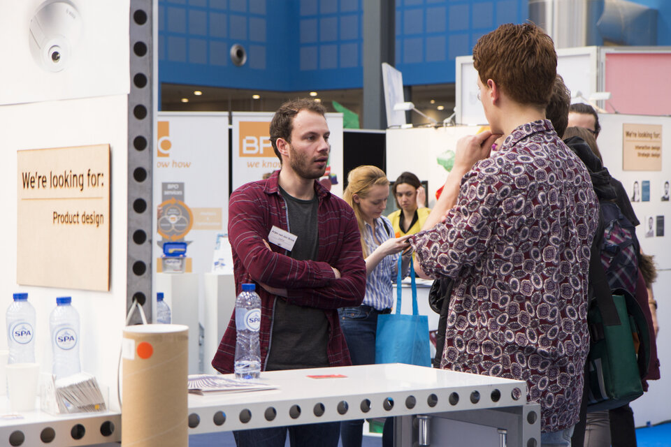 Sstudents in conversation at the faculty