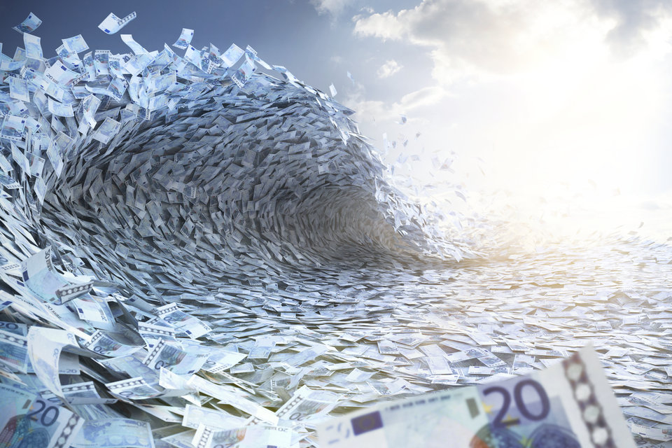Wave built of Euro banknotes in sunny weather conditions
