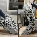 Robotic 3D-printed chaise longue changes into a bed